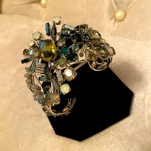 Swarovski swan stamped bracelet with multi color crystals in silver tone setting